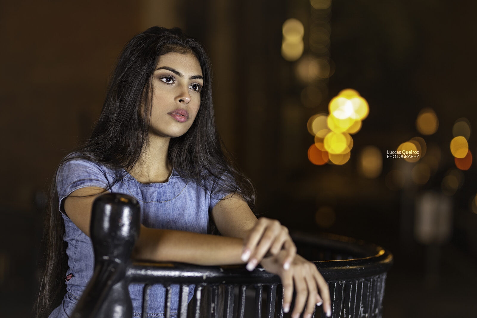 Portrait against night city lights
