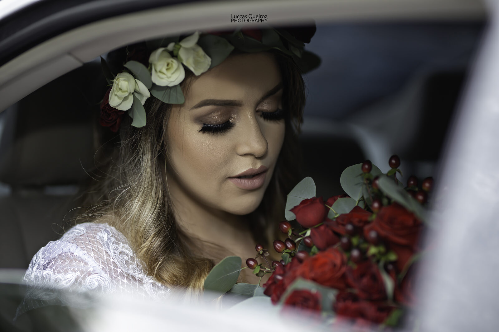 Bride with a red bouquet