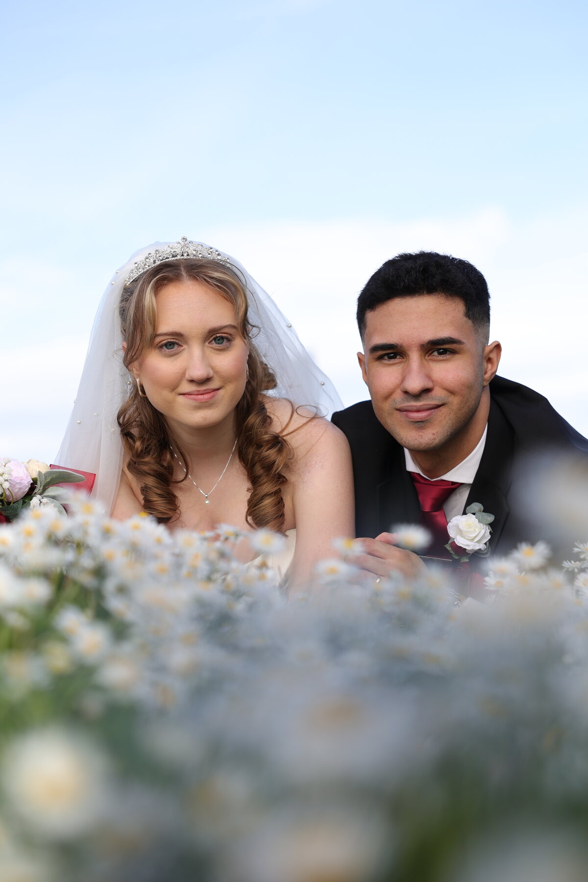 Couple in a field of daisies