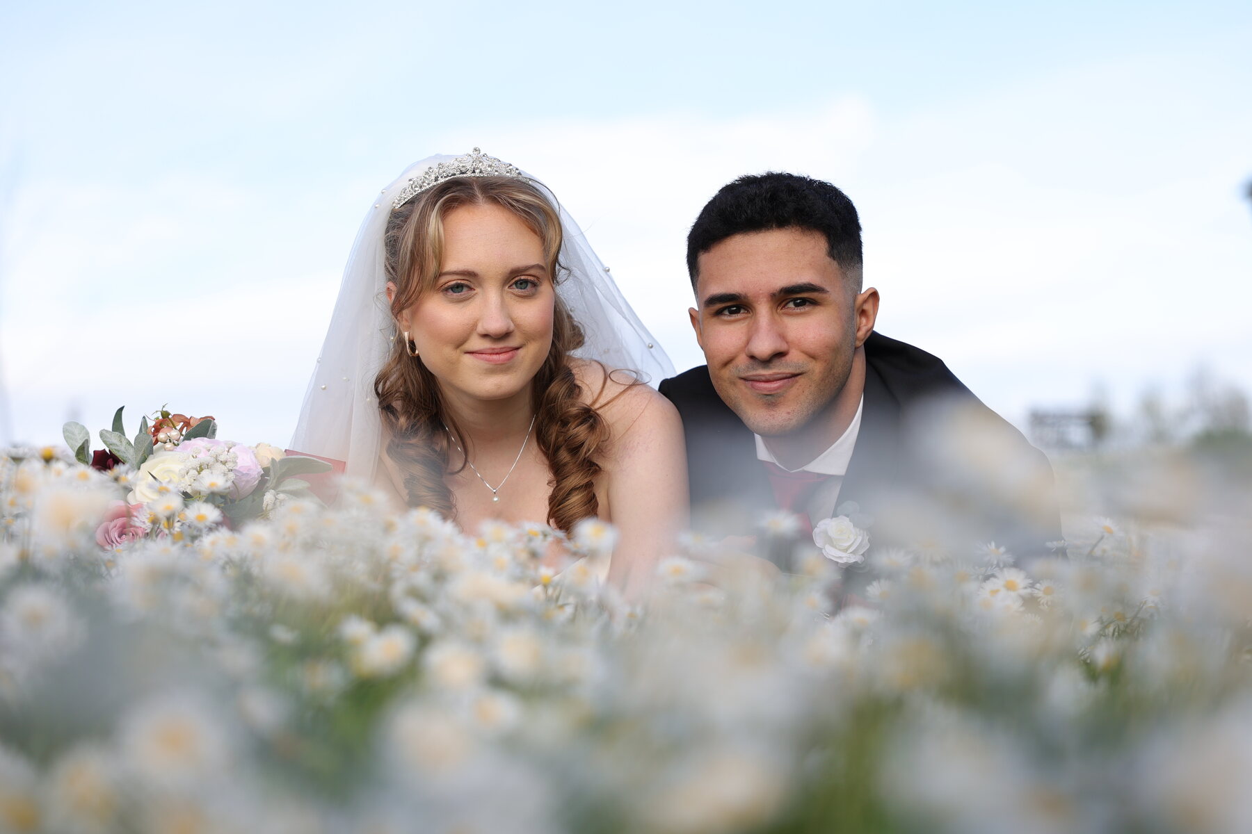 The couple among daisies